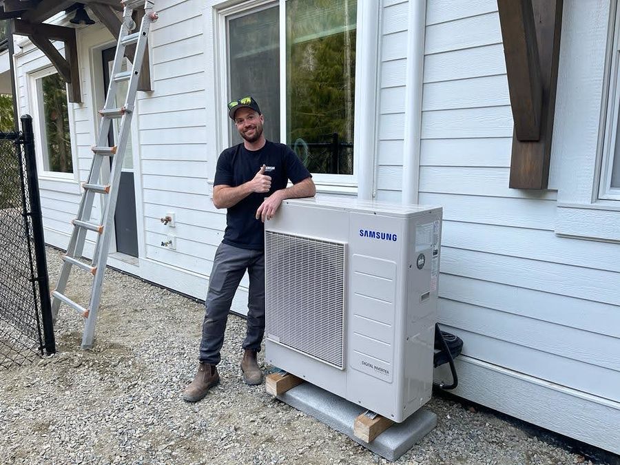 Split AC outdoor condenser unit installed outside a home
