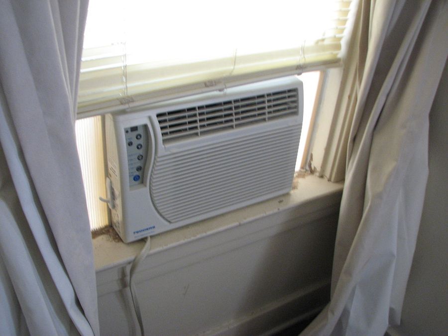 Window AC unit installed in a villa room in Qatar